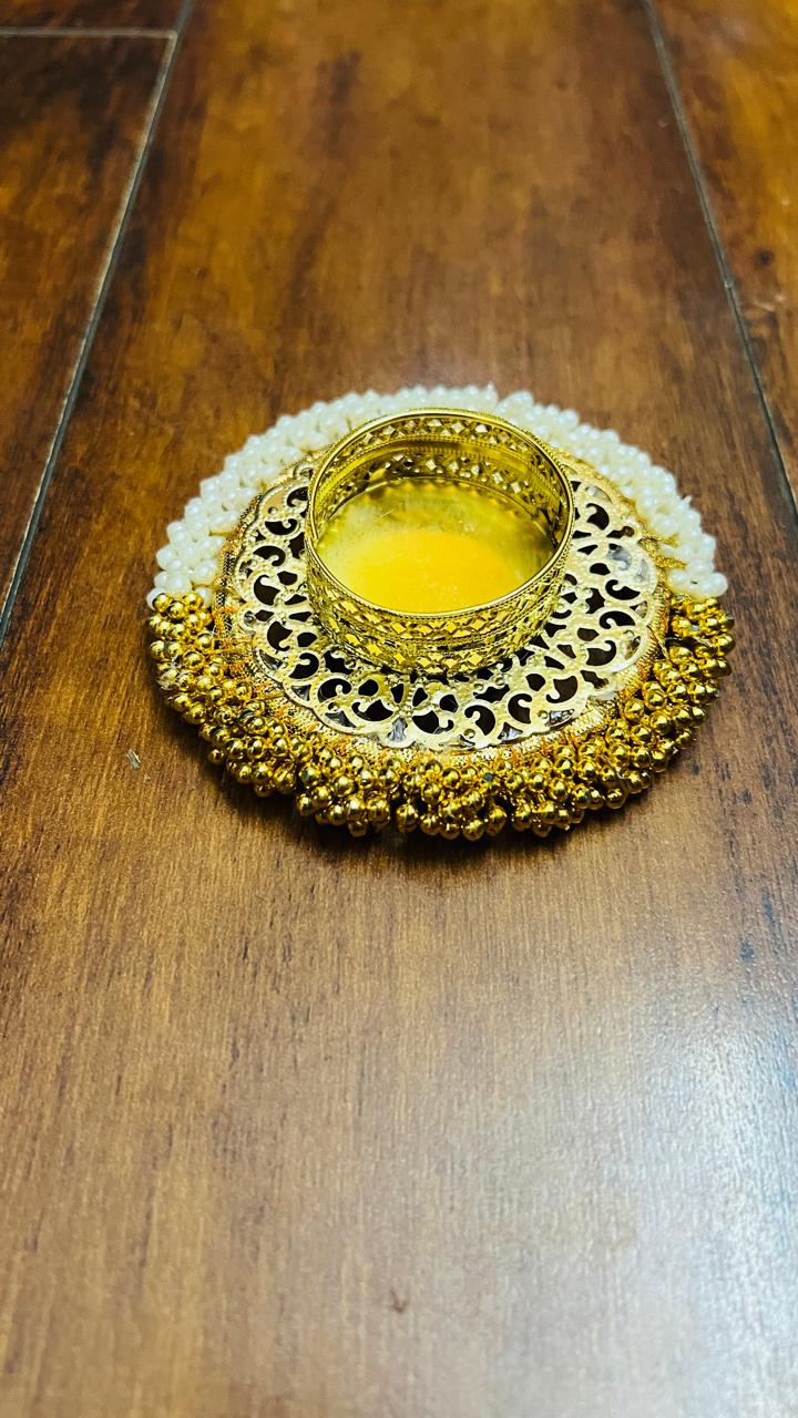Coming Soon !!! Gold-tone decorative candle stand with pearl and filigree detailing